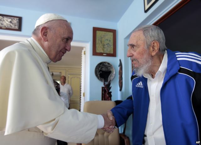 Pope Francis (left) meets Fidel Castro (right)