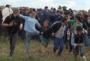 Hungarian Journalist tripping fleeing Syrians