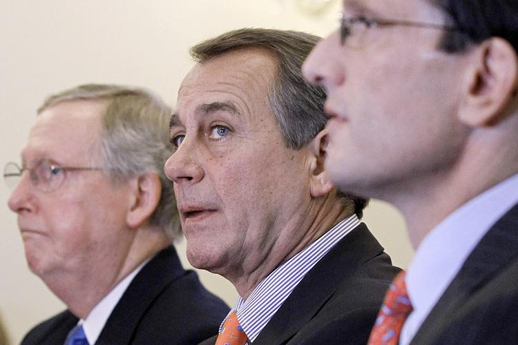 From left, Senate Republican Leader Mitch McConnell of Ky., House Speaker-designate John Boehner of Ohio, and House Majority Leader-elect Eric Cantor of Va., take part in a news conference, on Capitol Hill in Washington Tuesday, Nov. 30, 2010, following their meeting at the White House with President Obama. (AP Photo/Alex Brandon)