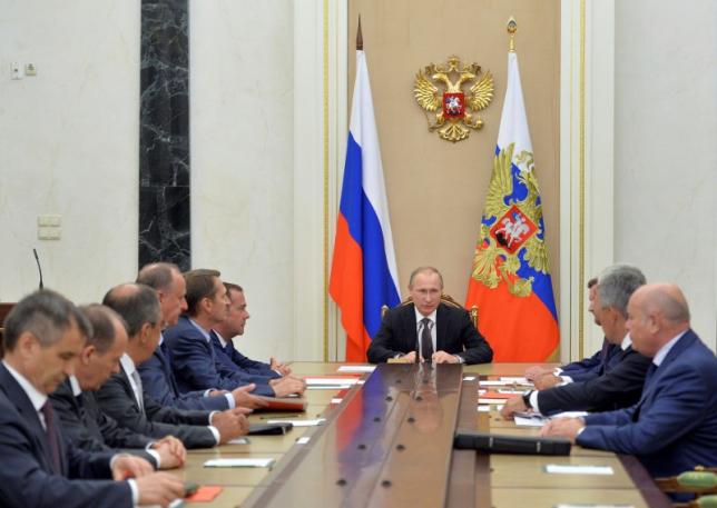 Russian President Vladimir Putin chairs a meeting with members of the Security Council to discuss additional security measures for Crimea after clashes on the contested peninsula, at the Kremlin in Moscow, Russia, August 11, 2016.  Sputnik/Kremlin/Alexei Druzhinin/via REUTERS